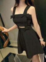 black mini dress with cutouts